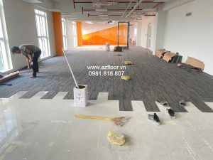 Thi công thảm sàn thanh dài