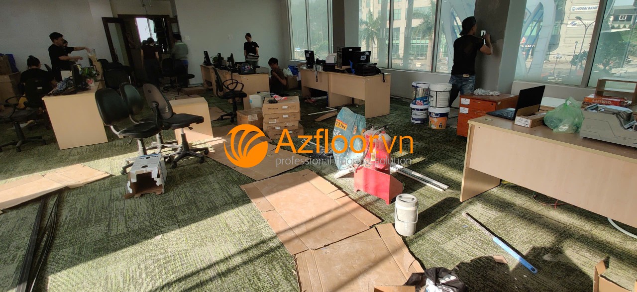 thi công sàn thảm ngân hàng Vikki