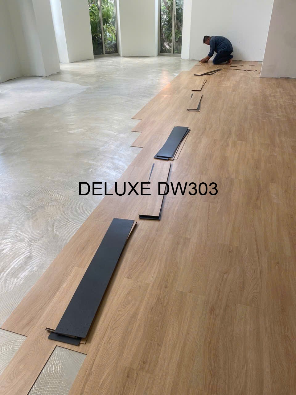 Thi công sàn vinyl dán keo Deluxe DW303